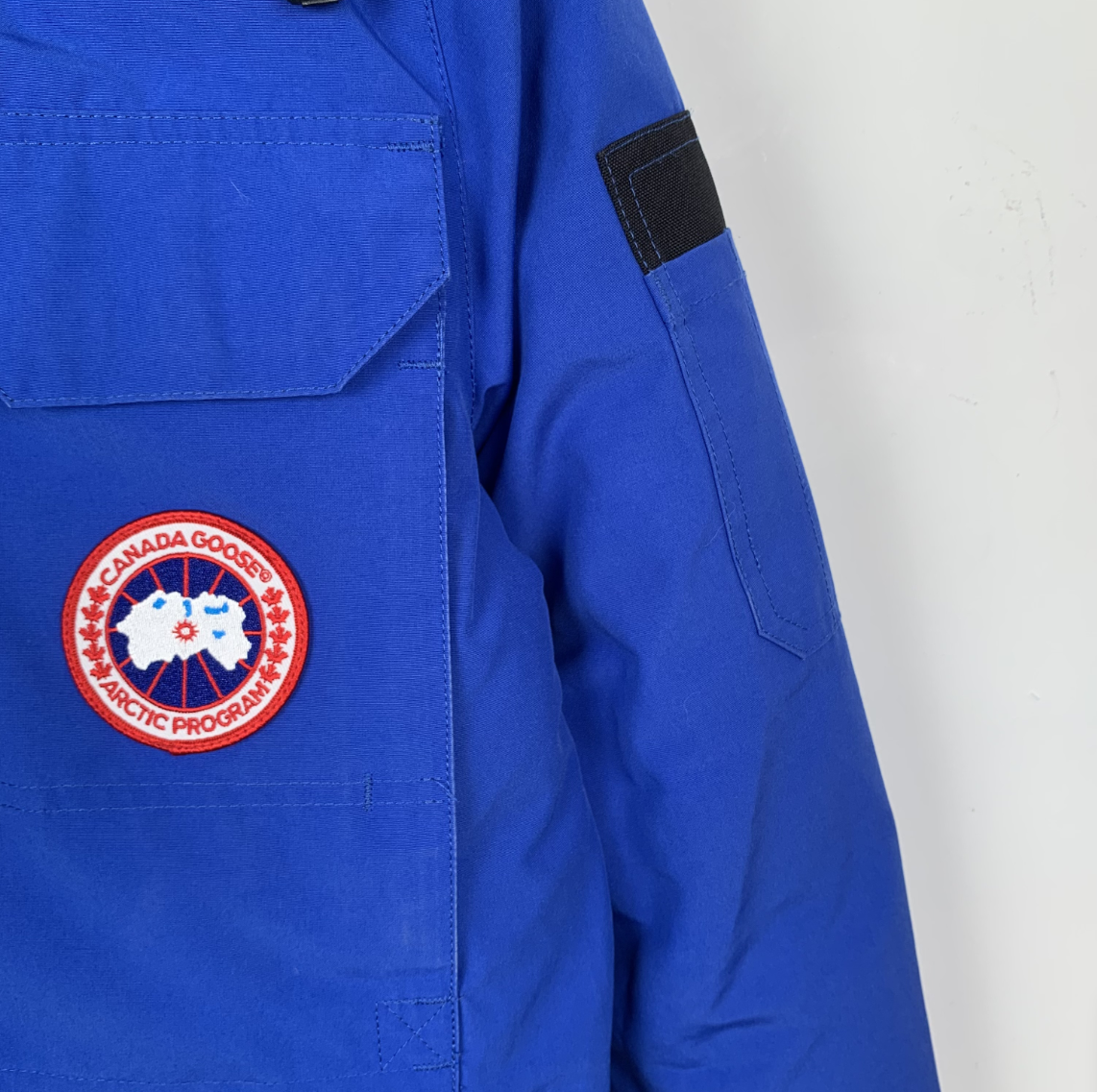 Canada Goose Blue Hooded Down Jacket with Logo Patch and Multiple Pockets