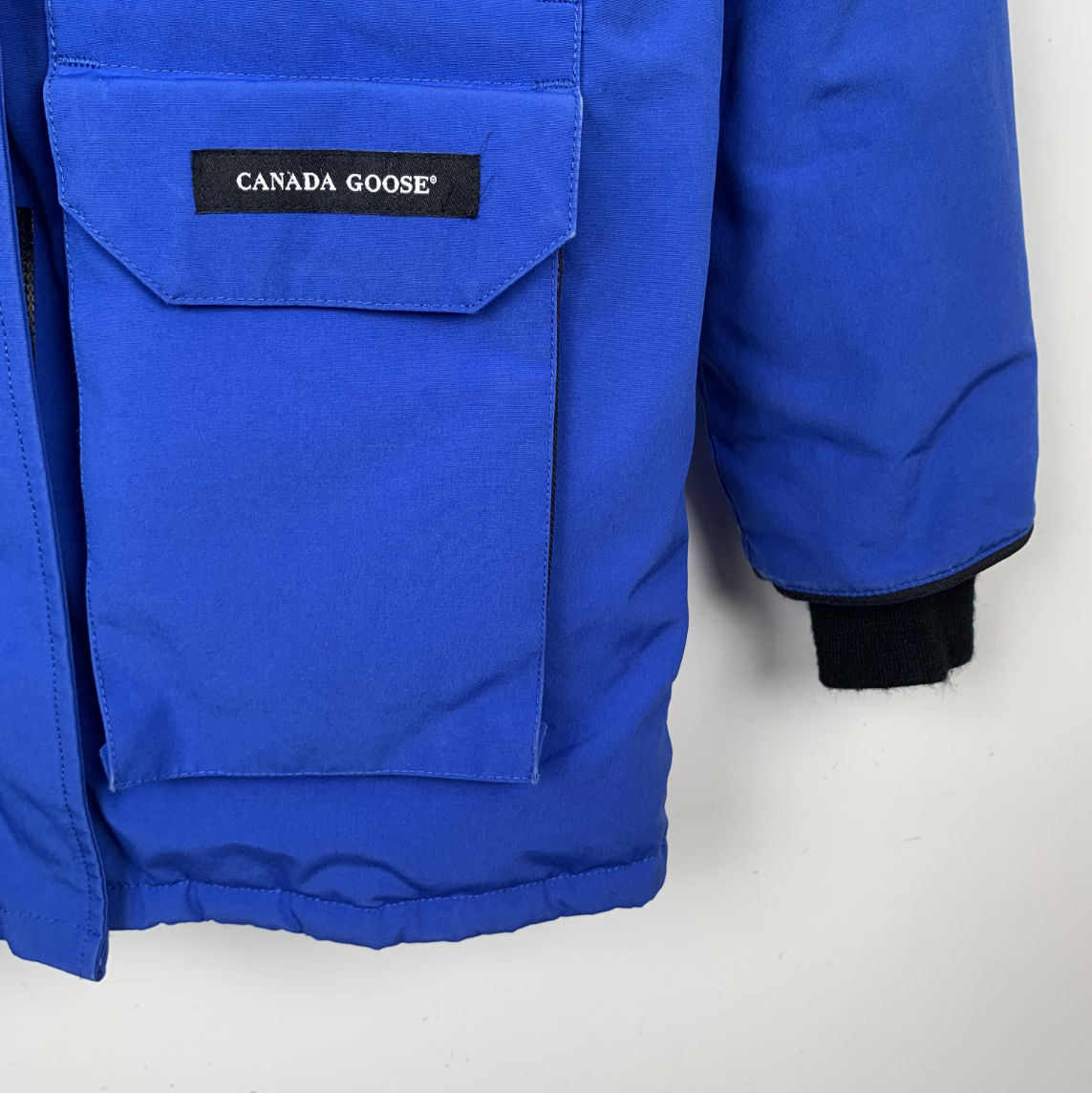 Canada Goose Blue Hooded Down Jacket with Logo Patch and Multiple Pockets