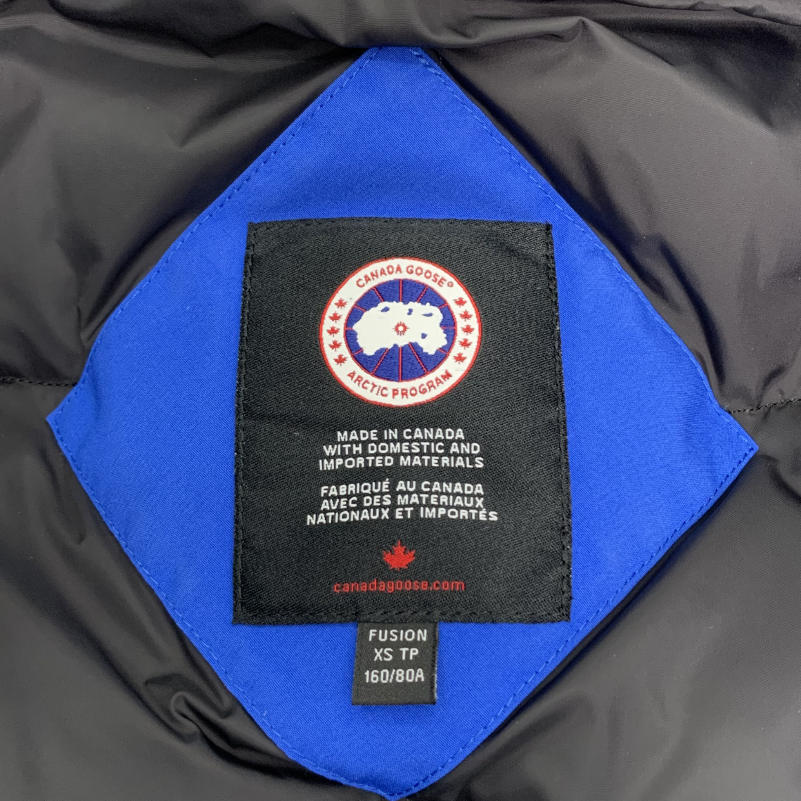 Canada Goose Blue Hooded Down Jacket with Logo Patch and Multiple Pockets