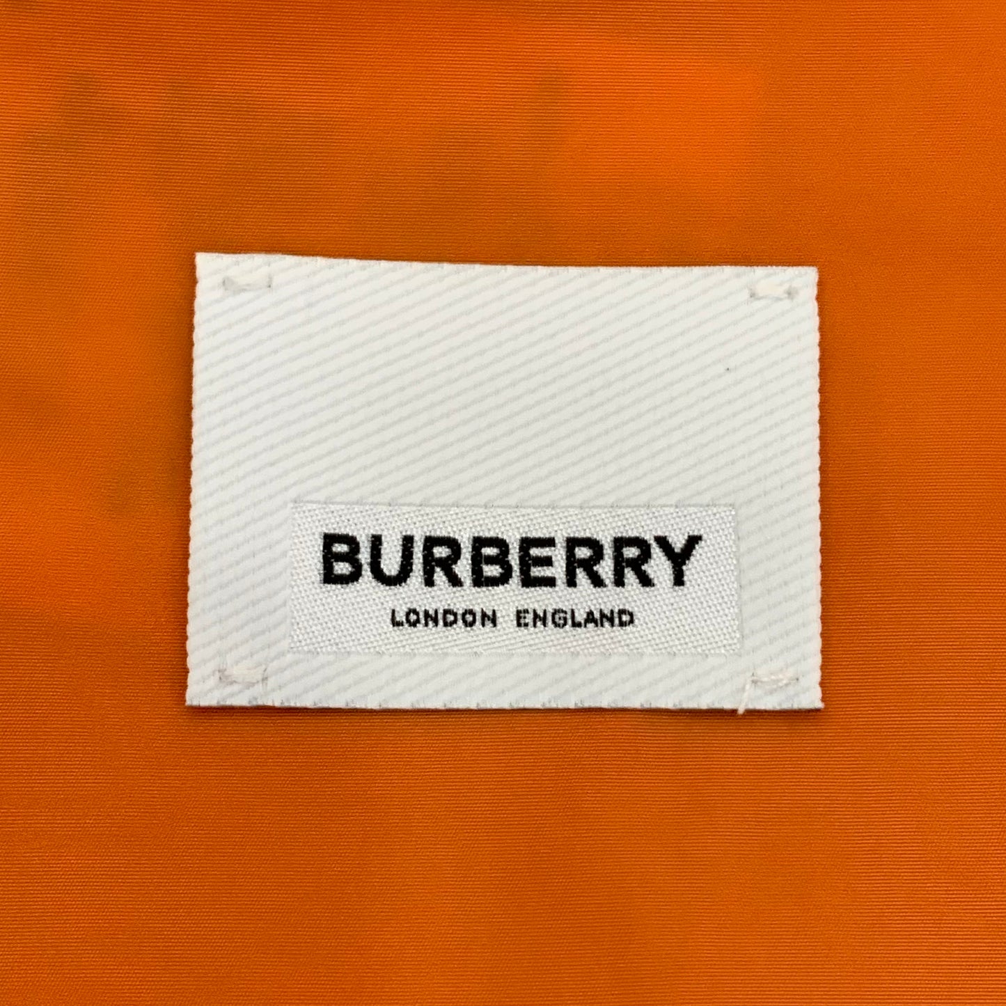 Burberry orange hooded jacket with letter print