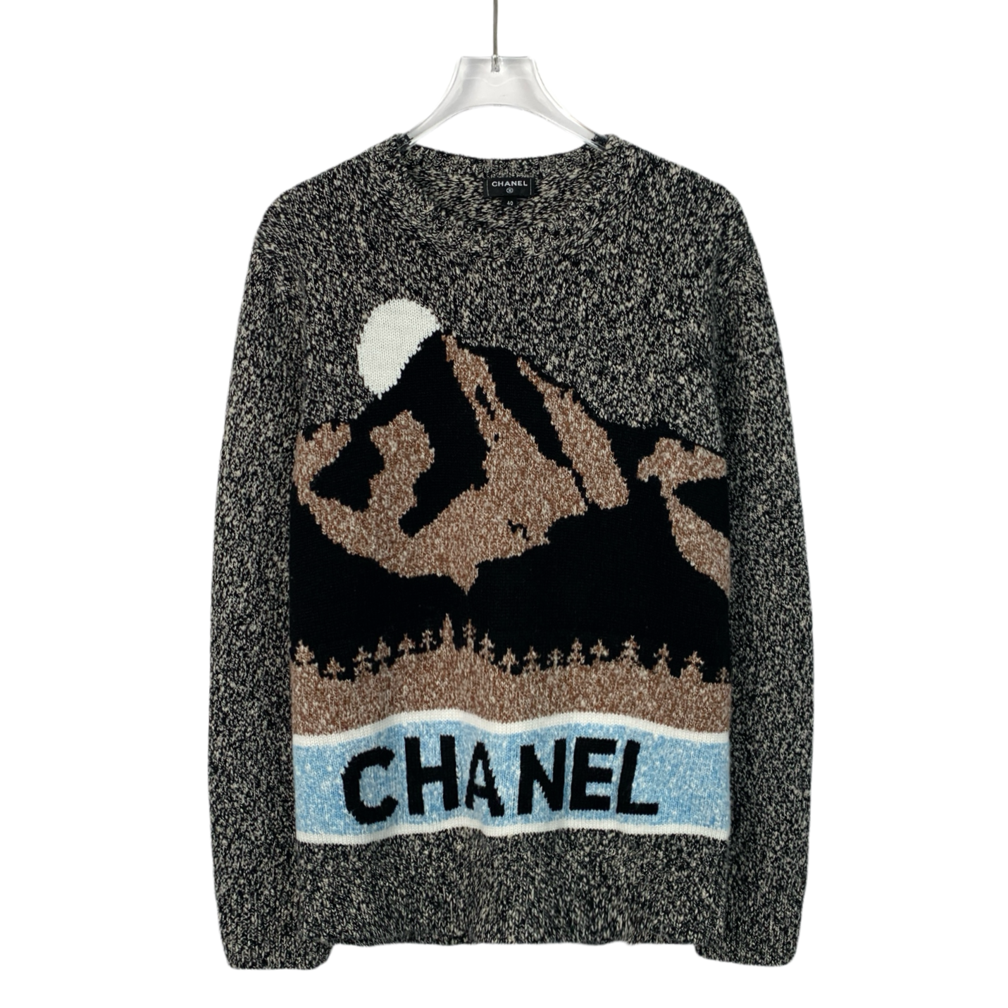 Chanel Ski Collection 2024 color-block cashmere sweater with logo intarsia, crew neck, and long sleeves