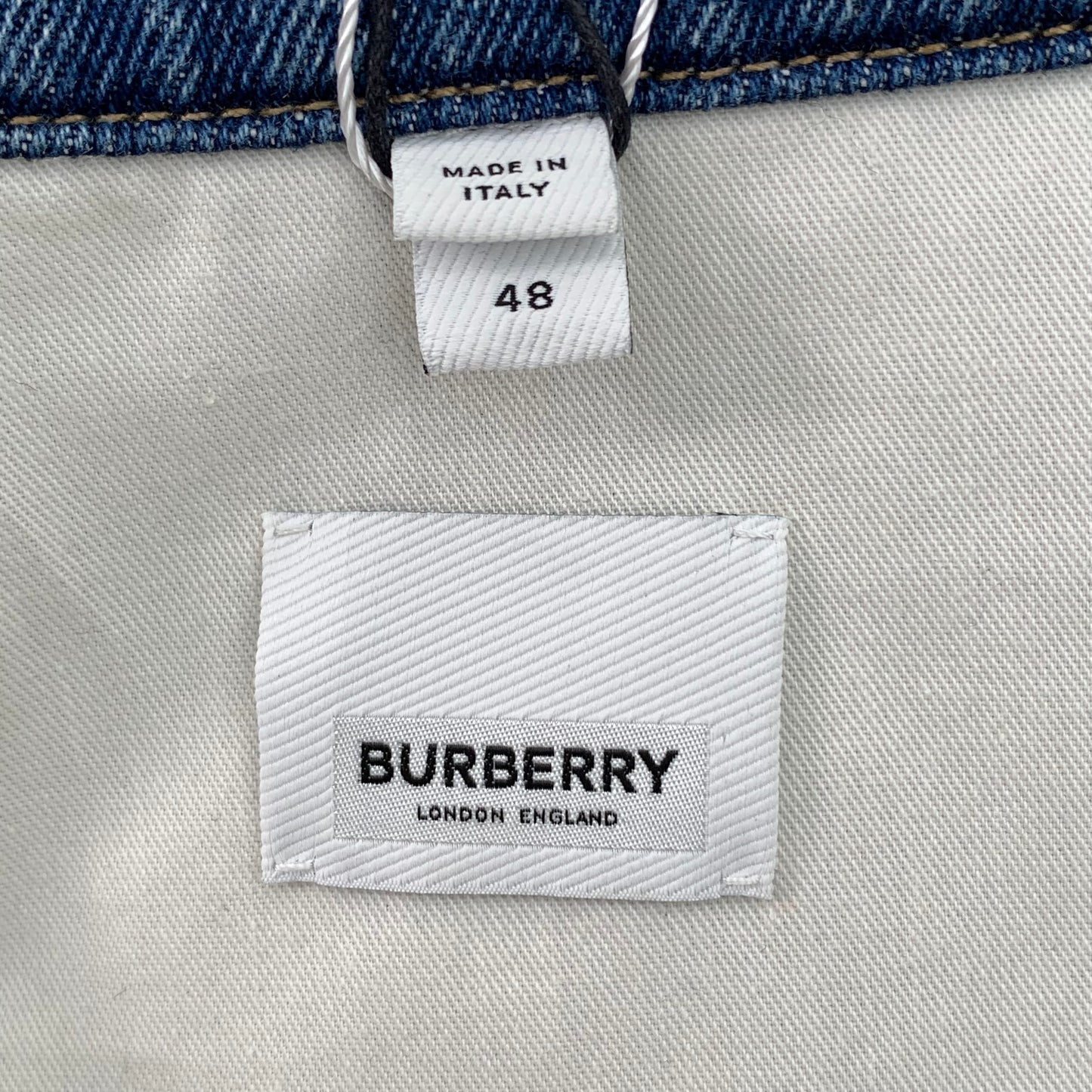 Burberry Blue Denim Jacket with Bottle Cap Embellishments and Collared Design